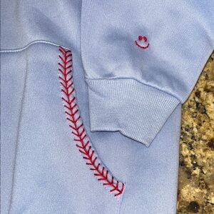Light Blue Hoodie with Red Baseball Stitching